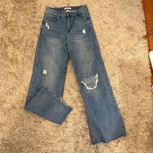 Women's Distressed Blue Jeans